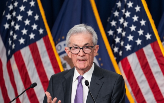 US Fed keeps key rate unchanged for 5th straight time, signals 3 rate cuts this year