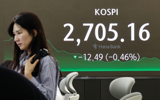 Seoul shares close lower ahead of parliamentary elections, US inflation data
