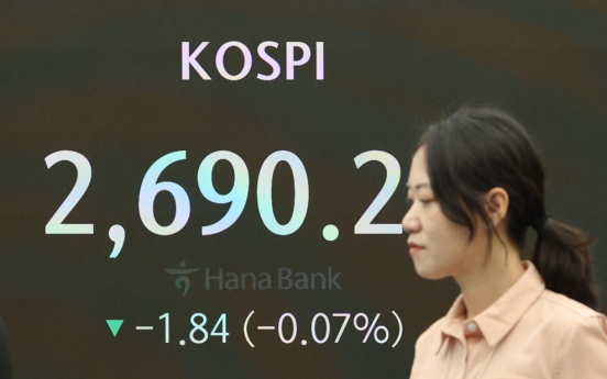 Seoul shares open lower on Fed's rate freeze