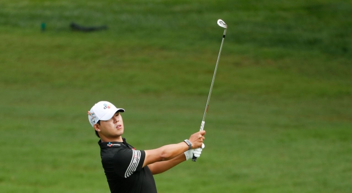 S. Korea's Kim nearly makes two aces in grabbing PGA lead