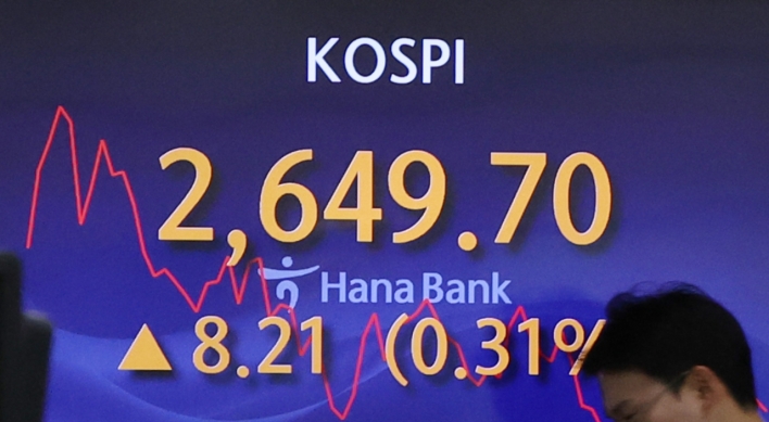 Seoul shares open higher as Fed chair hints at possible rate cut this year