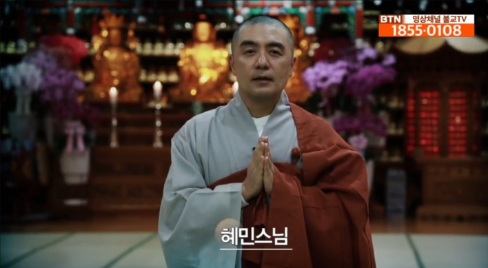 Celebrity monk returns to TV after uproar over his wealth, lifestyle