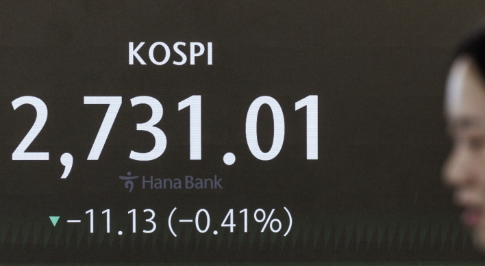 Seoul shares open lower on declines in technology stocks