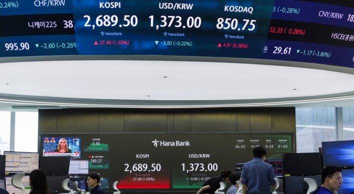 Seoul shares rise over 1% on US rate cut hopes