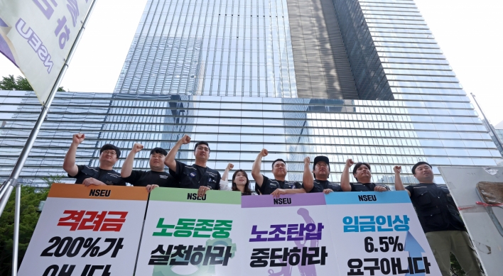 Unionized workers of Samsung Electronics stage walkout over wages