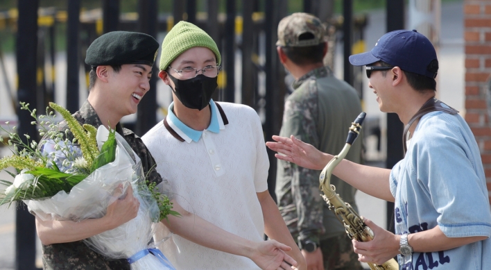 BTS' Jin returns from military duty amid bandmates