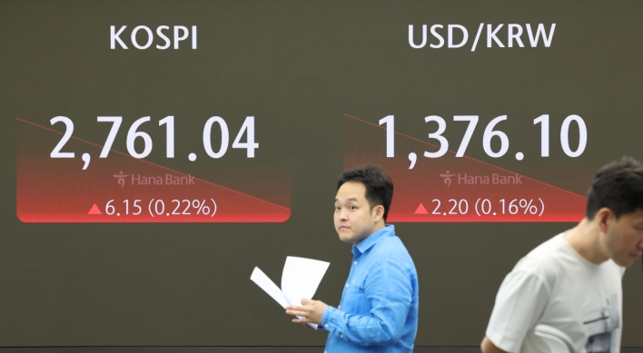 Seoul shares open higher on Wall Street gains