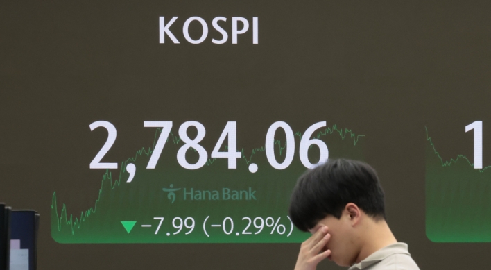 Seoul shares end lower on chip slump after Micron earnings
