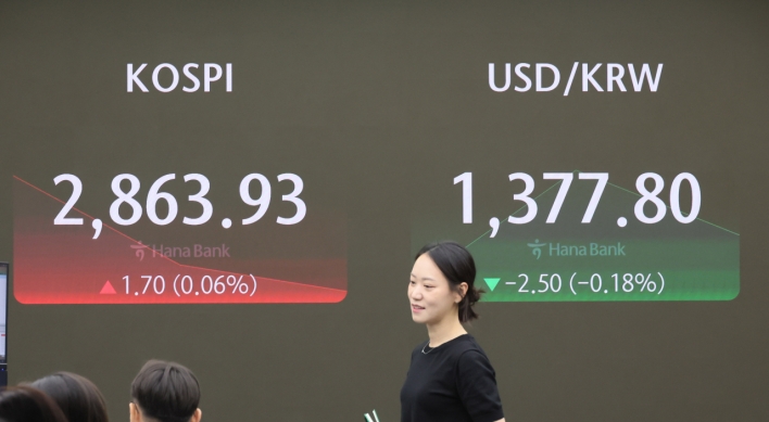 Seoul shares open tad higher on US rate-cut hopes