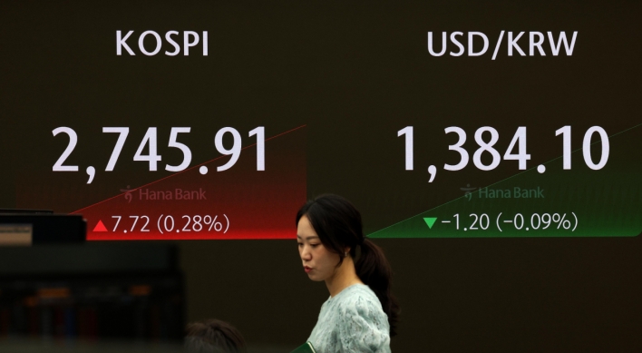 Seoul shares open higher on rate cut hopes