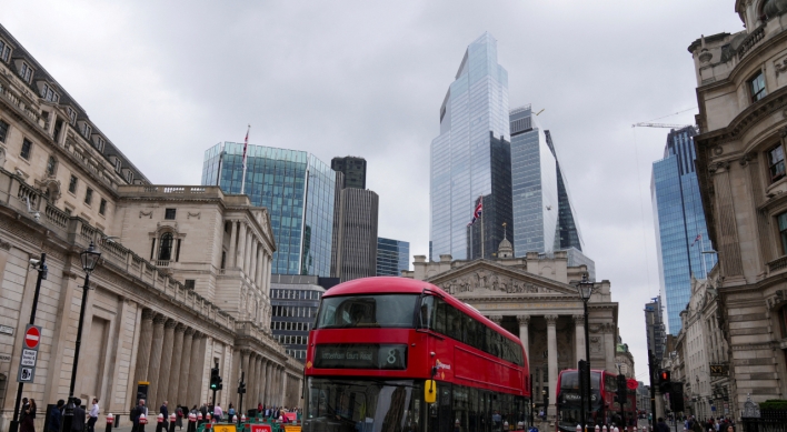 Bank of England cuts rates from 16-year high, 'careful' on future moves