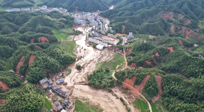 At least two dead after landslides in southwest China