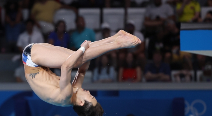 Diving medal hopeful Woo Haram reaches semifinal in men's springboard