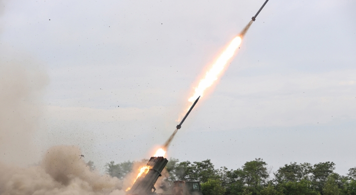 N. Korea test-fires multiple rocket launcher equipped with new guidance system