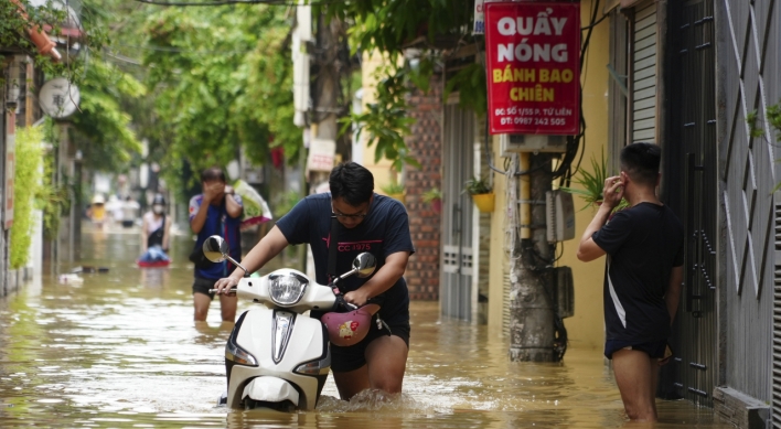 Vietnam typhoon death toll rises to 233 as more bodies found in areas hit by landslides and floods