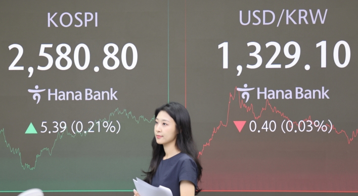 Seoul shares end higher after Fed's rate cut