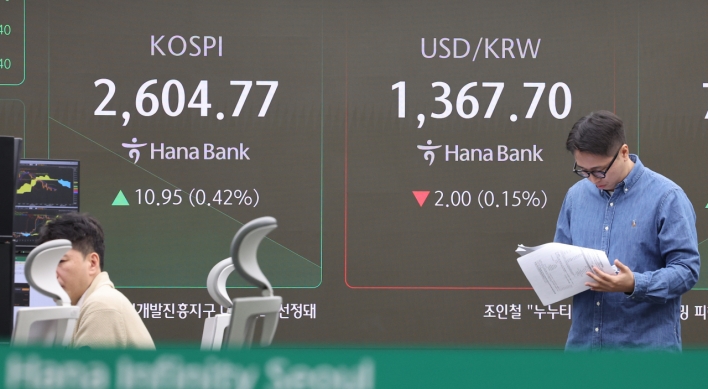 Seoul shares open higher on Wall Street gains