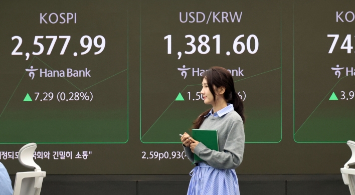 Seoul shares open higher on retail buying