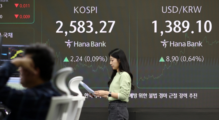 Seoul shares end tad higher; won at nearly 4-month low