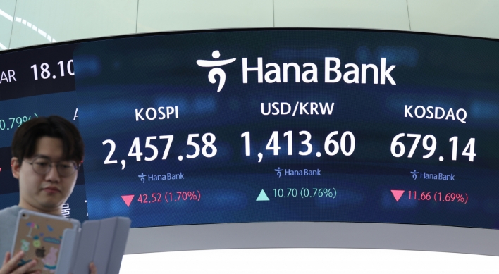 Seoul shares open lower after short-lived martial law attempt