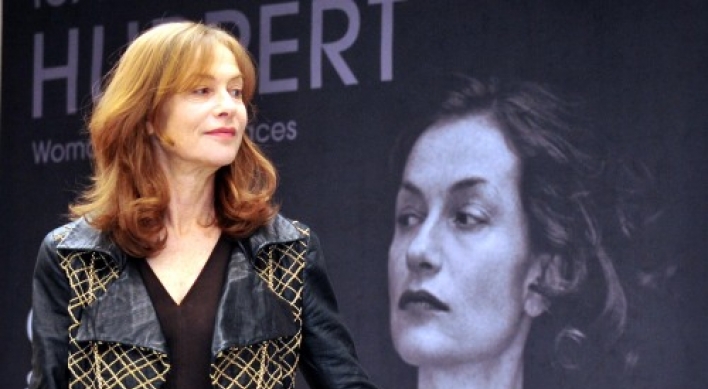 Huppert shows unknown sides in Seoul