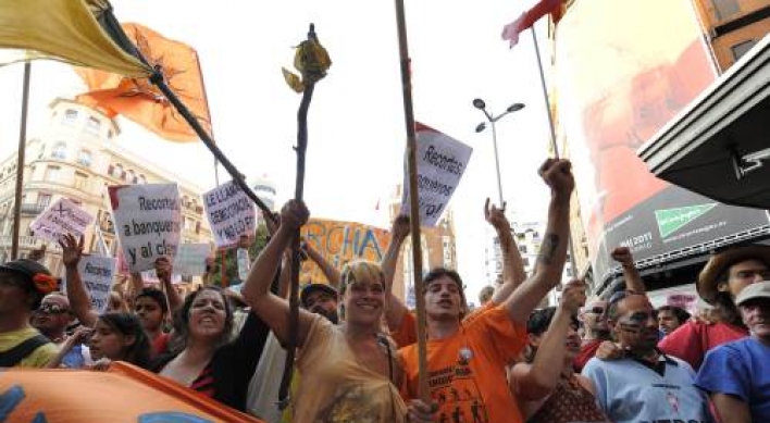 Protest marches converge on Spain’s capital