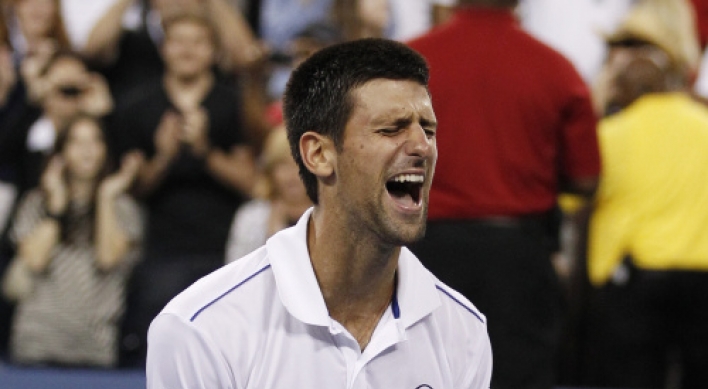 Djokovic reigns in New York