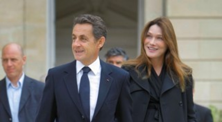 Sarkozy‘s flower power won over Bruni