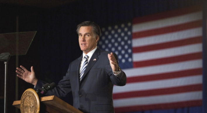 Romney responds to Mormon flare-up; Perry passes