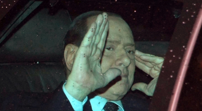 Berlusconi to resign amid debt woes