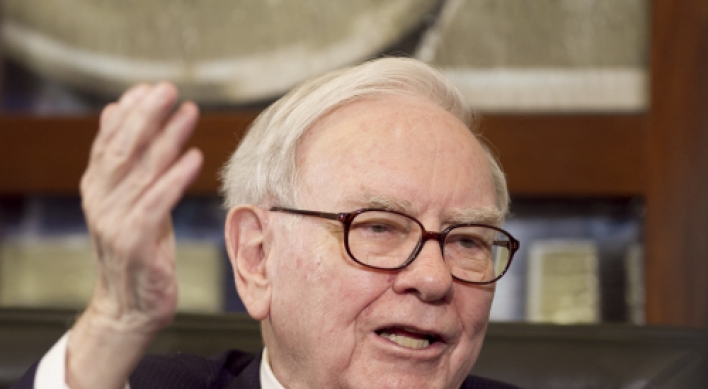Berkshire buys 5 percent of IBM, takes other stakes