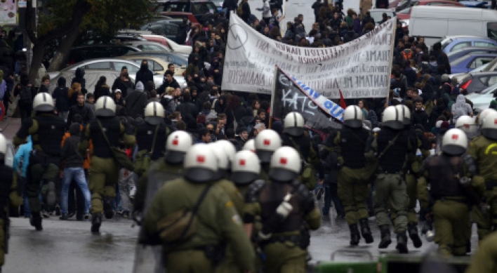 Greece passes austerity budget after clashes