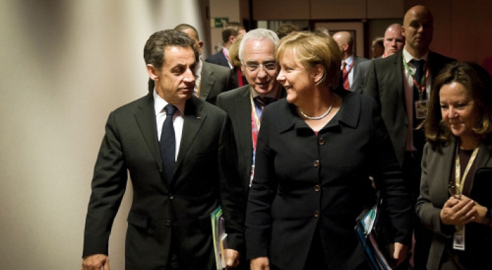 New treaty to save euro splits European Union