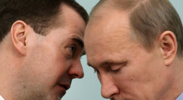 Putin resists rerun; Kremlin ideologist out