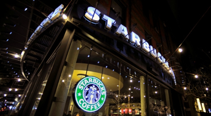 Starbucks to add wine at more cafes to lure evening diners