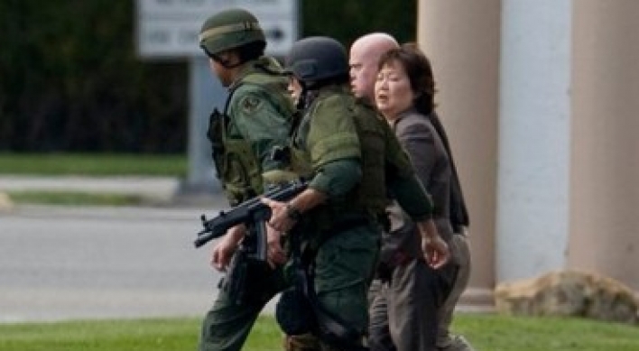 U.S. Police wound hostage-taker at Korean bank
