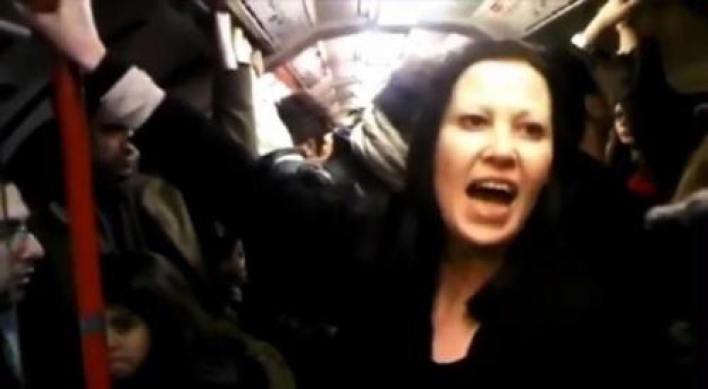 Woman admits to racist rant on subway