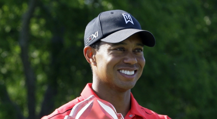 Tiger adds epic shot, dramatic win to his legend