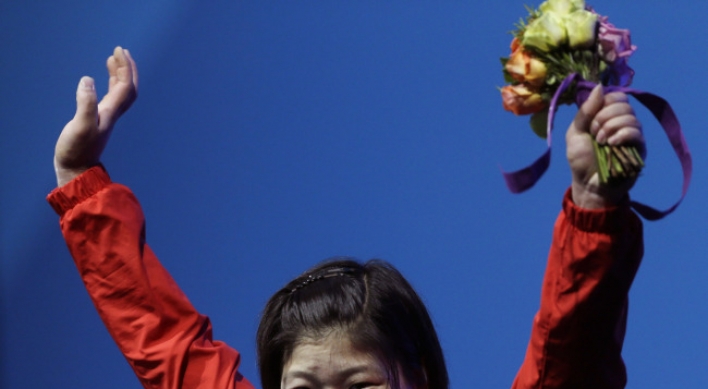 North Korean Rim wins women's -69kg weightlifting