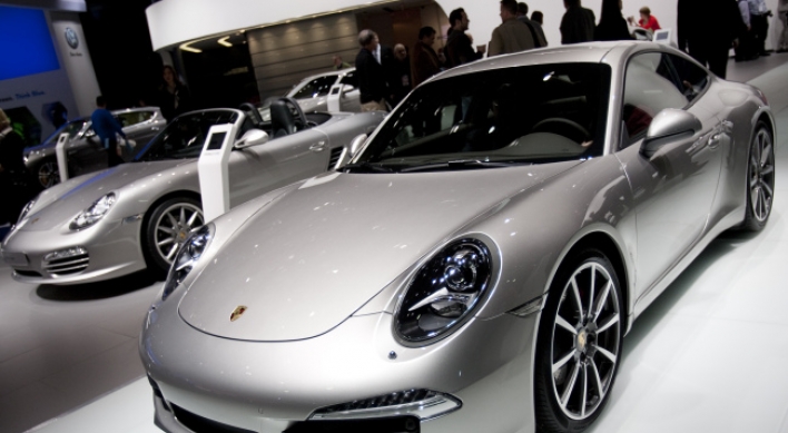 VW completes purchase of Porsche
