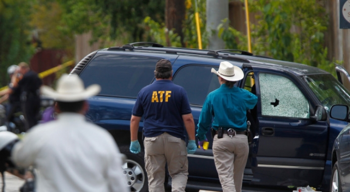 Officer, gunman among 3 killed in Texas shootings