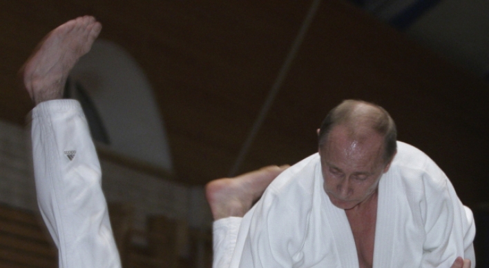 Sports-mad Putin promoted to the eighth dan in judo