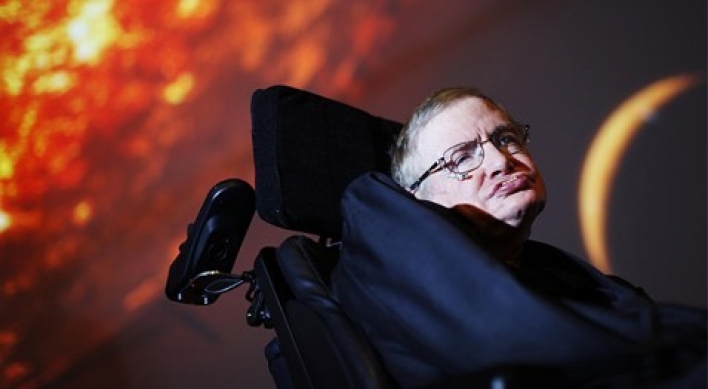 Stephen Hawking conjures black hole in ad