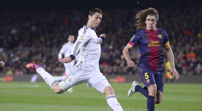 Ronaldo leads Madrid past Barca to make Copa final