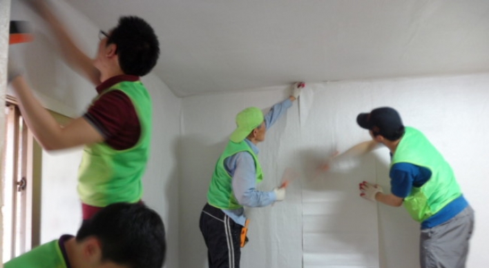 Wallpapering for needy households