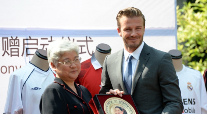 Beckham shines during China visit