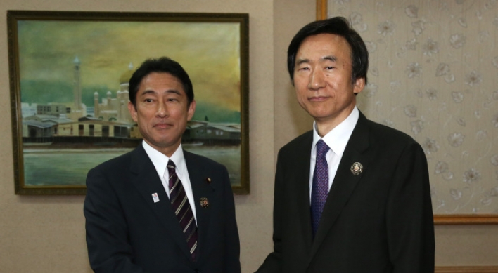 Korea, Japan ministers meet to mend ties