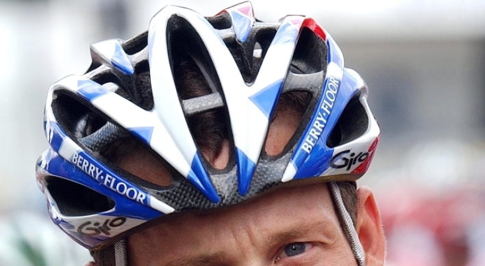Two books examine Lance Armstrong’s character and the industry around him