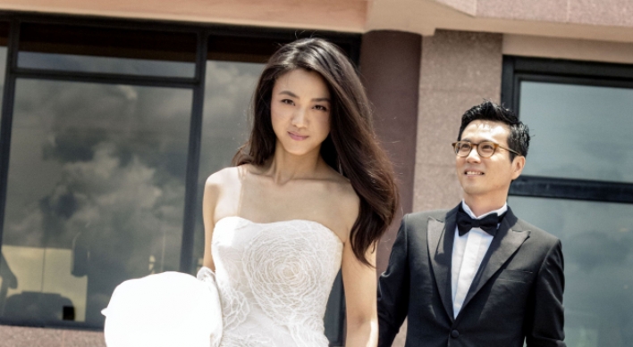 Tang Wei and Kim Tae-yong marry