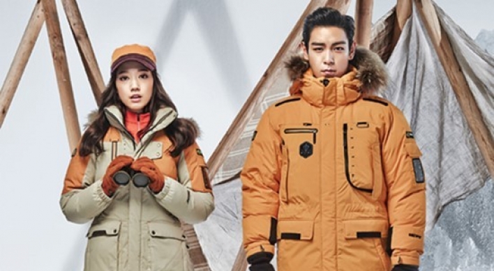 Park Shin-hye and T.O.P in outdoor wear